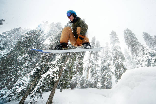 A tourist enjoying snowboarding at Kashmir